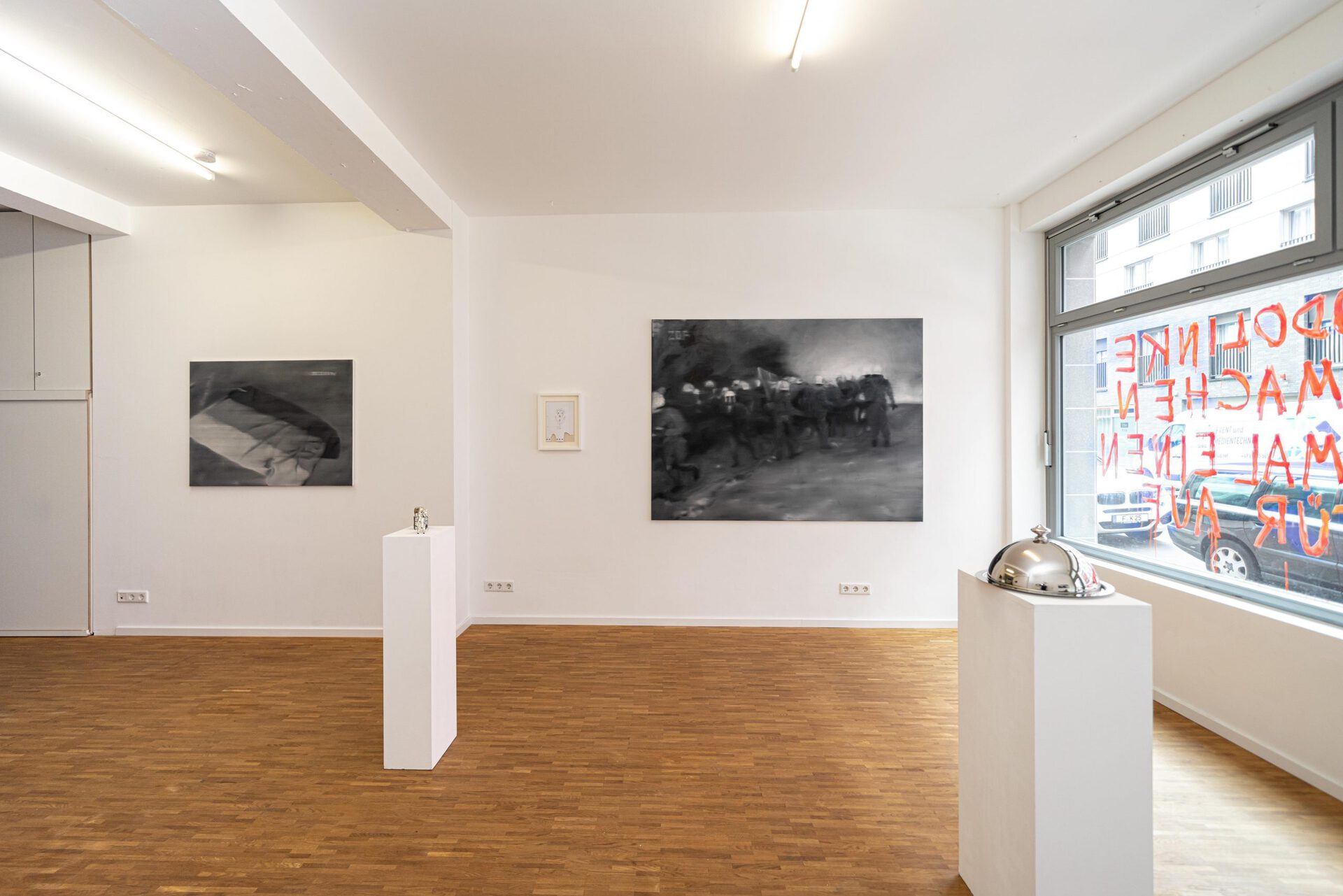 Exhibition view with front window: Nicholas Warburg "IN YOUTH IS PLEASURE" at Synnika Frankfurt.