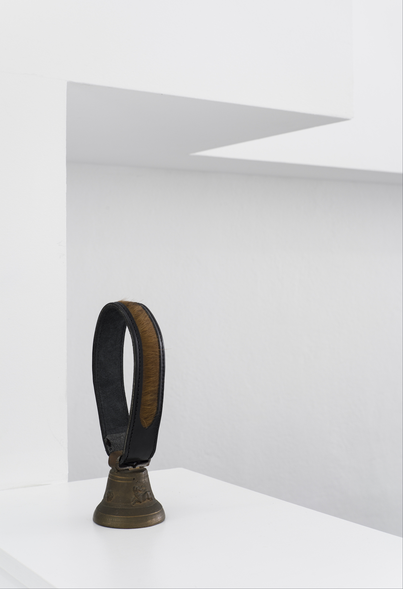Eliza Ballesteros, Domestic Heck VI (furry bell), leather collar, antique brass bell, fur, 15 x 5 x 5 cm, 2021
