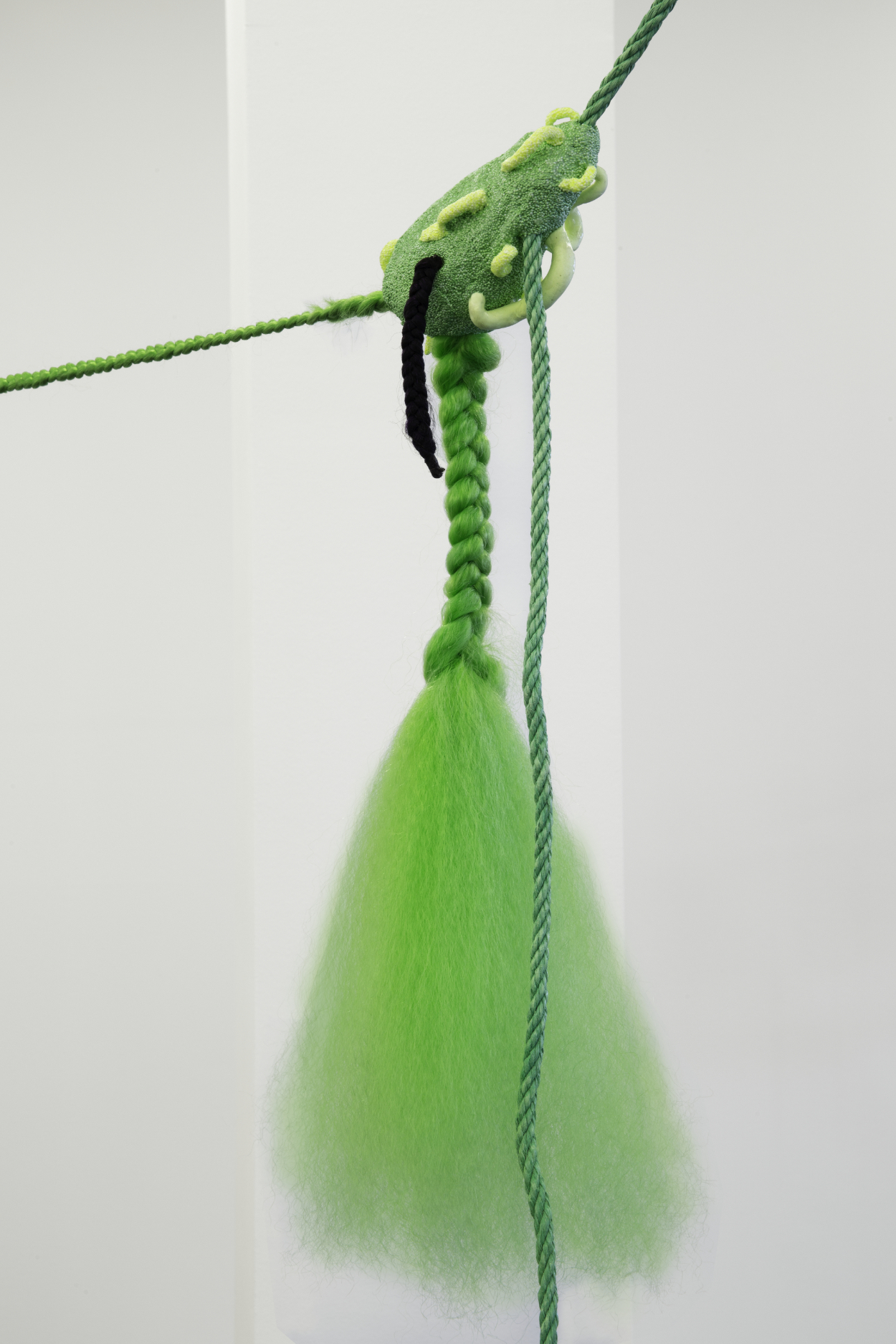 Theresa Weber, Detail of Lianes, 2019, rope, synthetic hair, modeling clay, chain, pearls, rosaries, braids, artificial nails on snap hooks