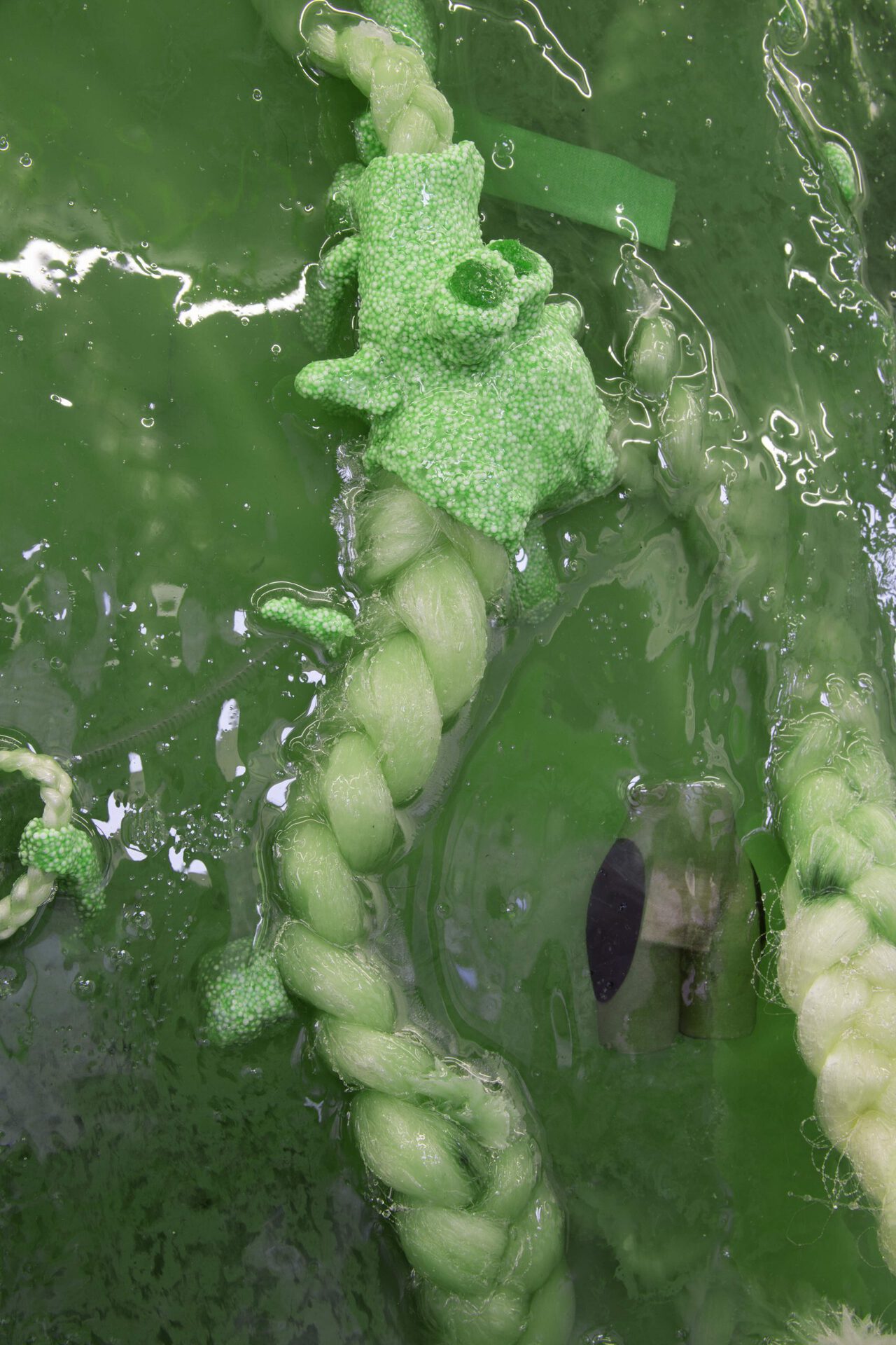Theresa Weber, Detail of Bacterium, 2020, synthetic hair, pigment, modeling clay, print on paper in polyester on metal