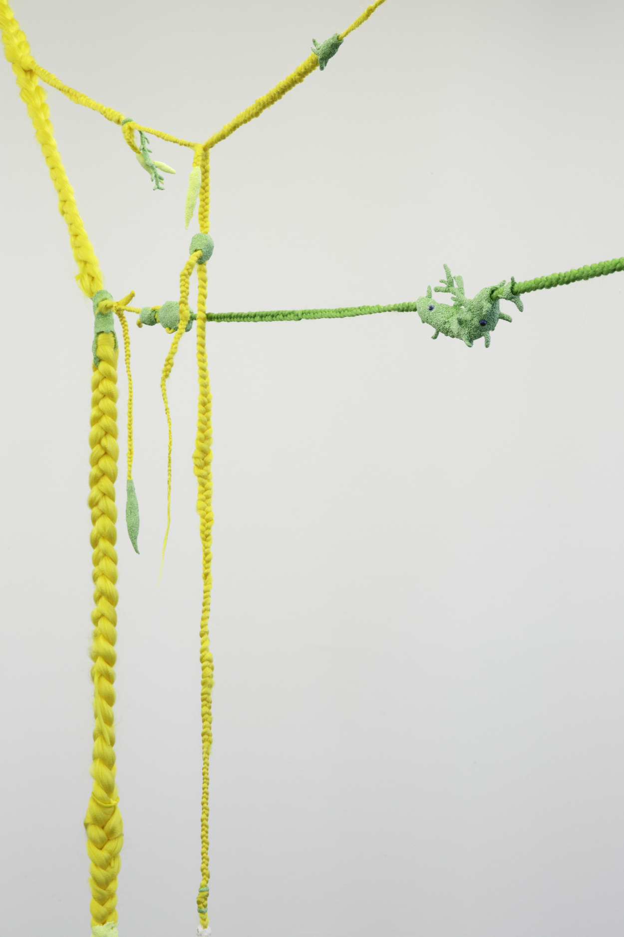 Theresa Weber, Detail of Lianes, 2019, rope, synthetic hair, modeling clay, chain, pearls, rosaries, braids, artificial nails on snap hooks