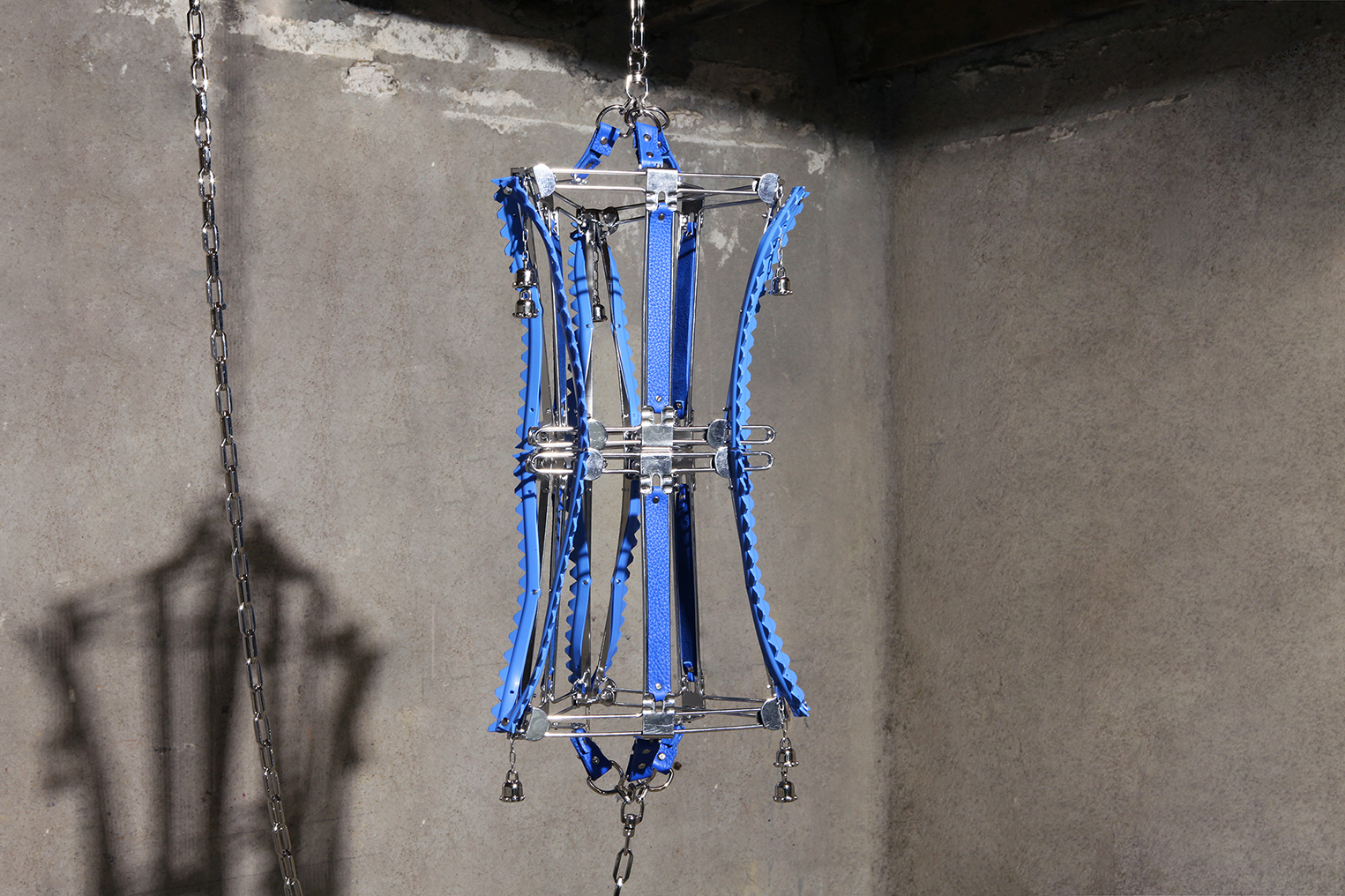 Floryan Varennes, Graal Theory, 2021, Sterilized steel, leather, steel chain, rubber, bells, 60 x 30 cm (detail).