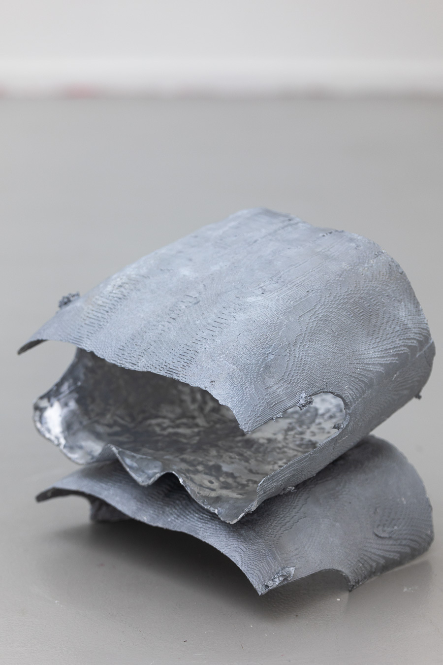 Kate Fahey, phantom, 2018, cast aluminium, 40x40x40cm