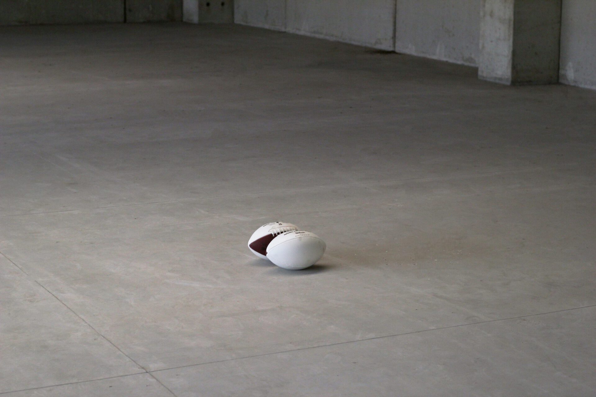 Untitled, 2021, American footballs