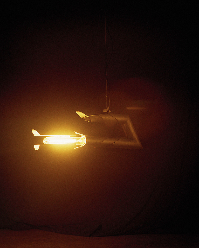 Szilvia Bolla, Aron Lodi,Elegy of the firefly, 2021, steel, high pressure sodium bulb, 100 x 40 x 10 cm