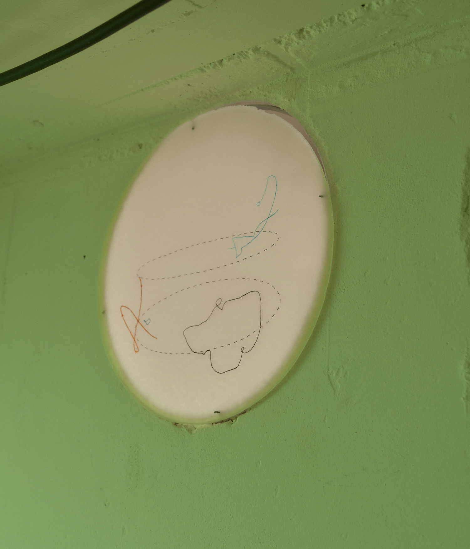 Group Dynamics 1-2 by Elina Vainio: Beeswax, tissue paper, aluminium band, steel wire, Ø 40 cm, 2021