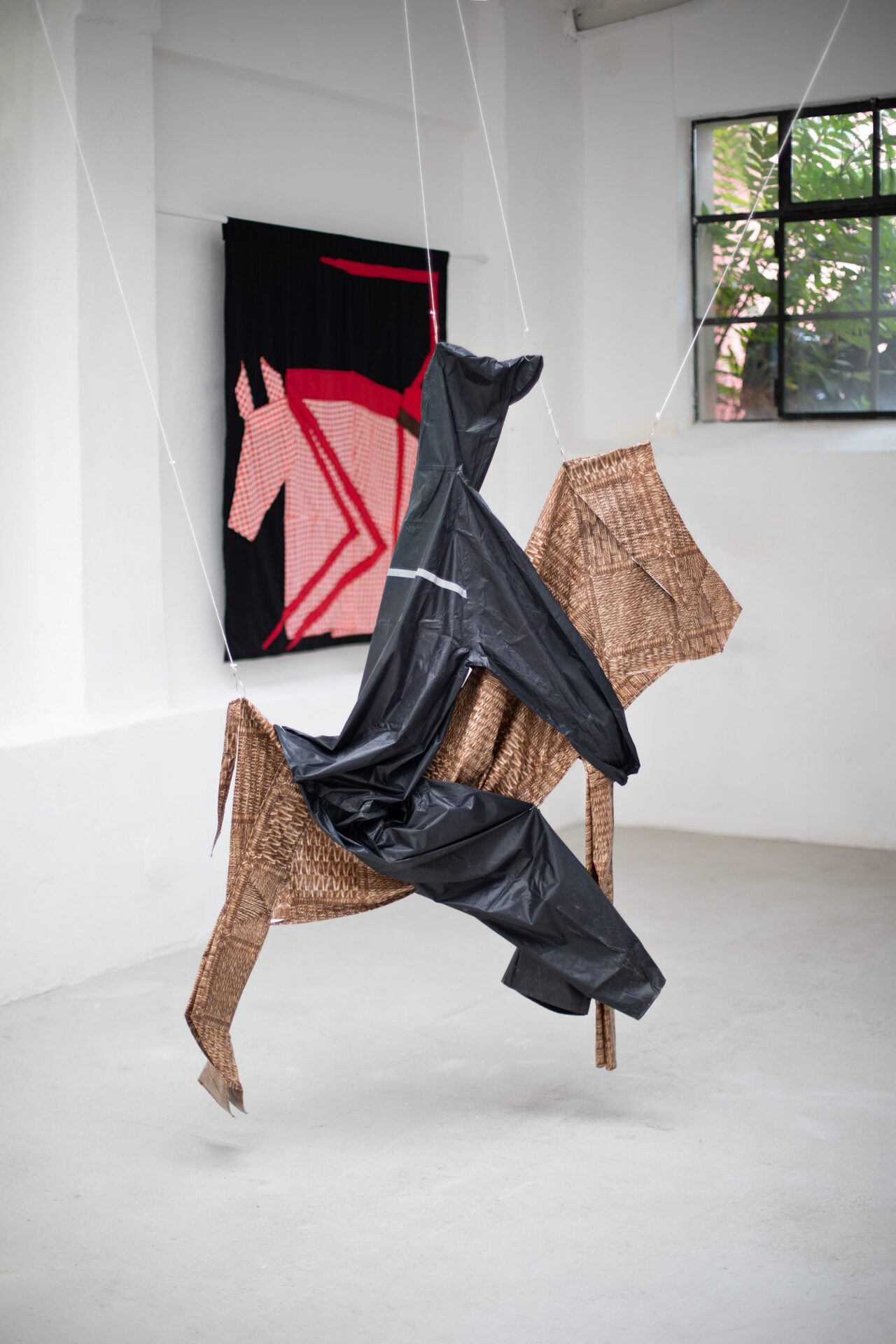 Ghost Rider, 2021, PVC, rainsuit, metal, ropes 110 x 150 x 10 cm