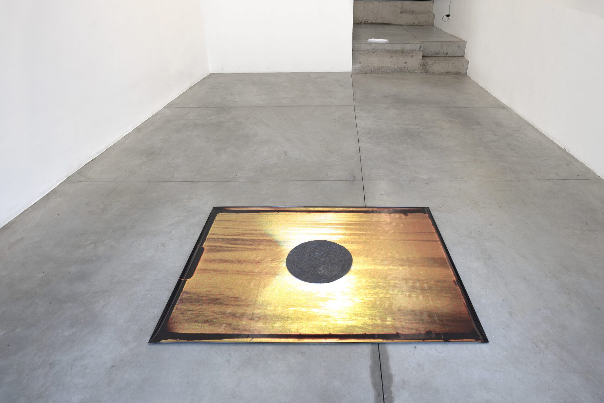 Janaina Wagner. Lead Sun, 2021. Super 8 film frame, plastic canvas and lead. 150 x 114 cm.