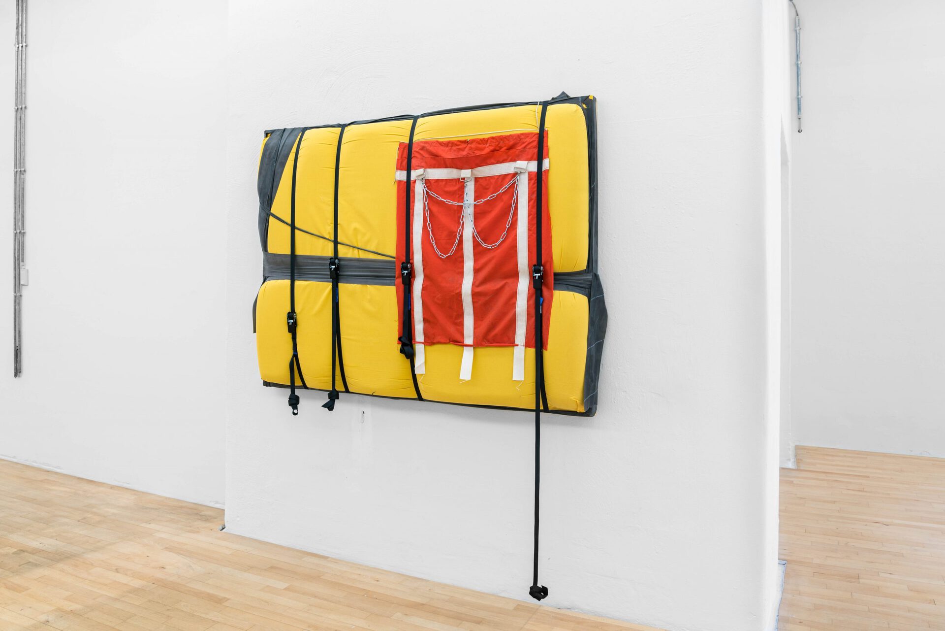 Jesaja Song-Gil Rüschenschmidt, CCMFZ, 2021, Foam, fireproof flag cloth, theraband, wood, tensions belts, boxing sack, 190x140 cm