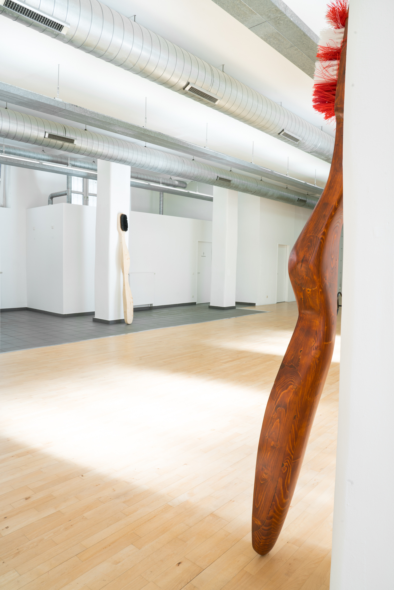 Rahel Goetsch, Candy Lover (P) + Candy Lover (A), 2021, wood, wax, and PVC bristles, 20 x 30 x 250 cm