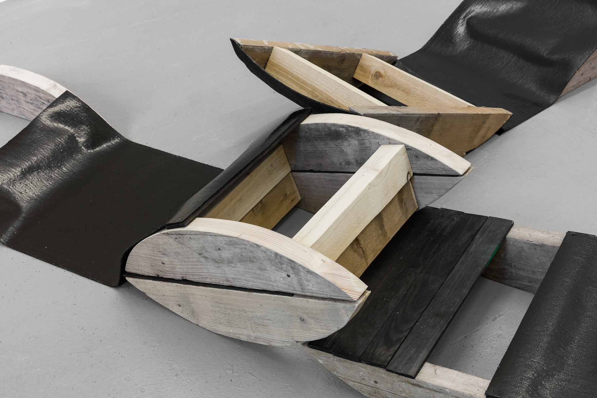 Johanna Cahrlotte Trede, A pack starts with Three, 2021, Wood, tar paper, each 14x65x50, _003