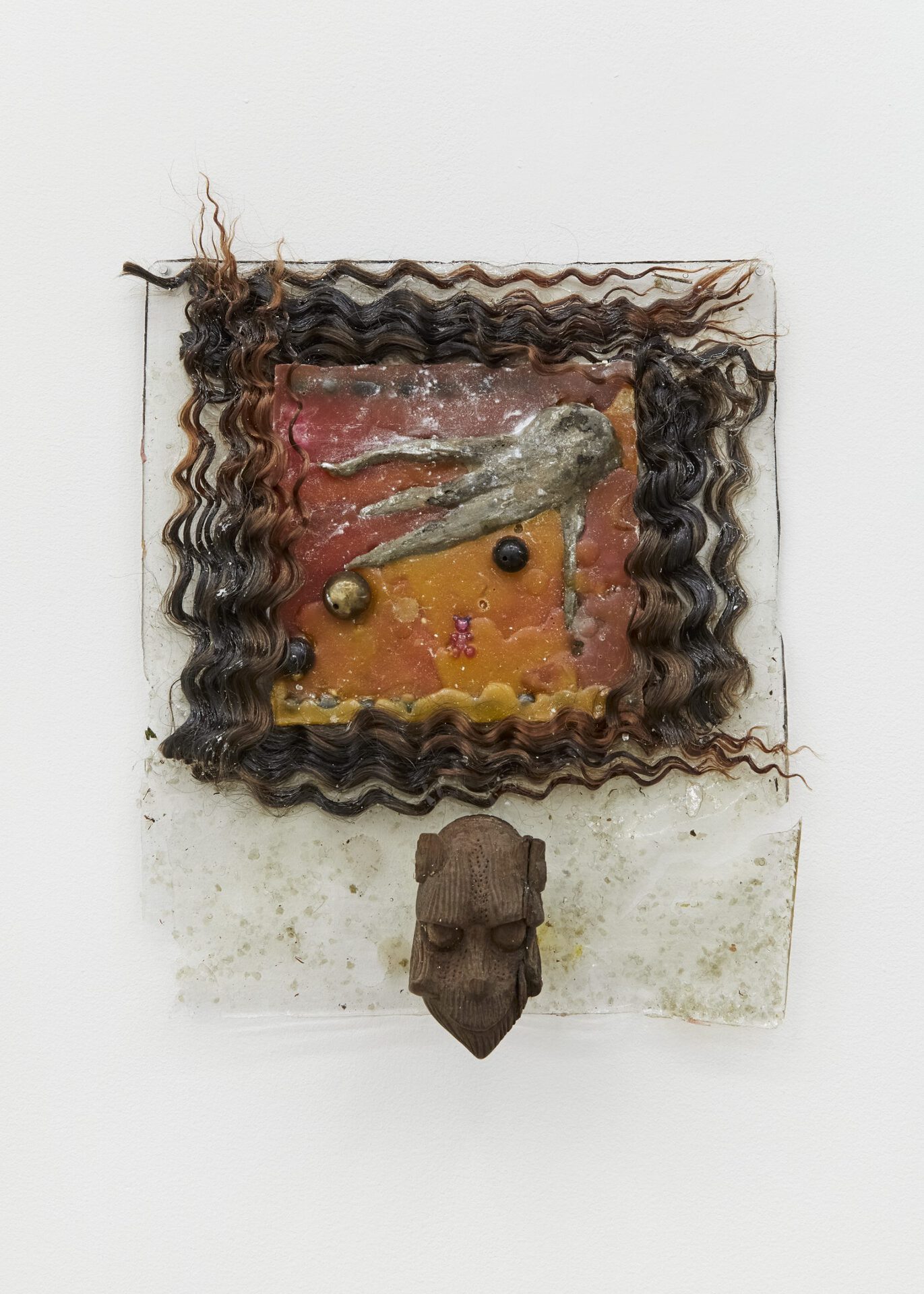 Julie Maurin, Triste dans la fête, 2021. Latex, pearls, synthetic hairs, wooden found object, wax, epoxy resin, 33 x 27 x 7 cm