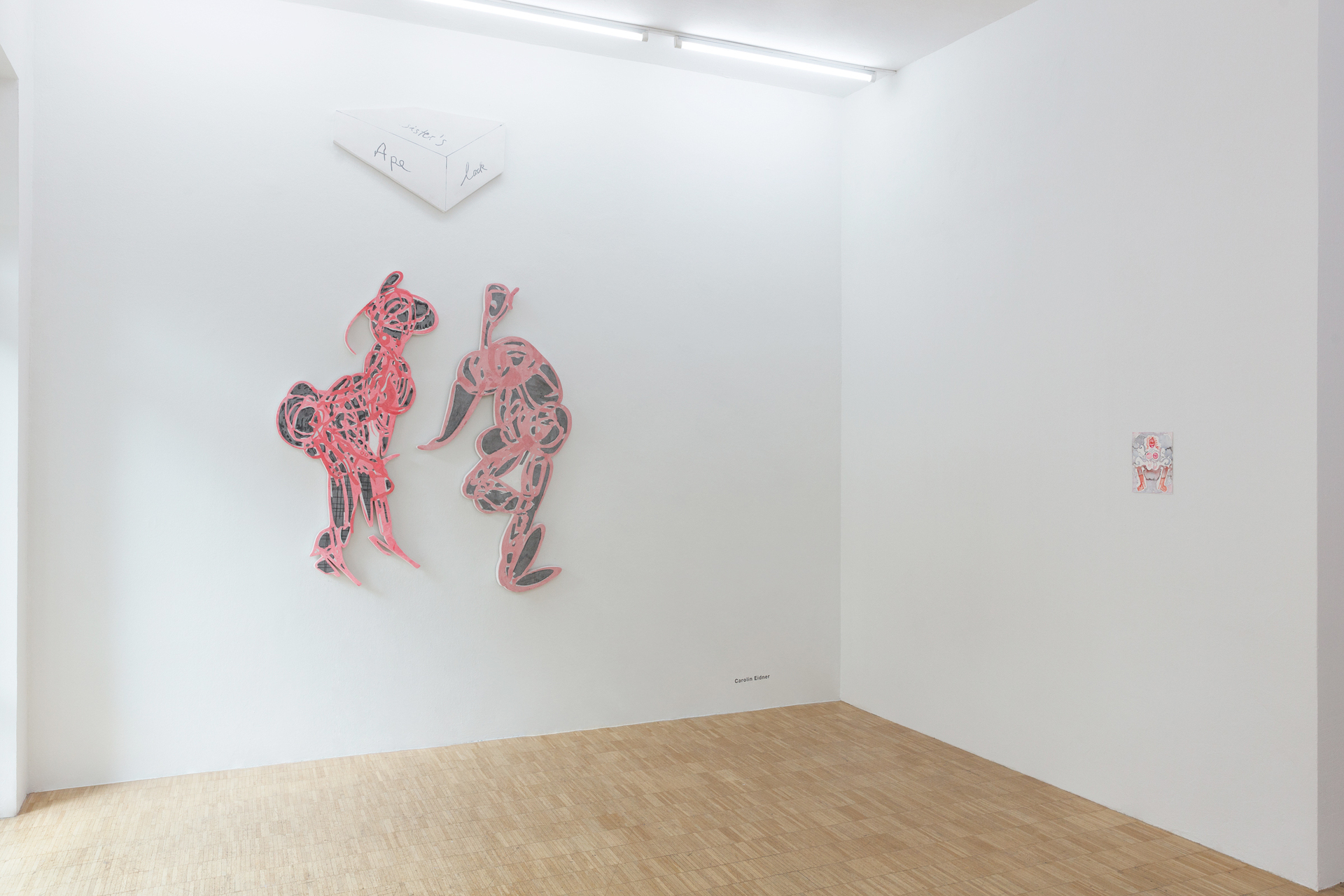 Exhibition view, Carolin Eidner (on the left), 'Sister's Ape Lack', three pieces on the wall, each pigmented plaster on wood, styrofoam ; Susie Green (on the right), 'Susie's Party' (detail), 2021