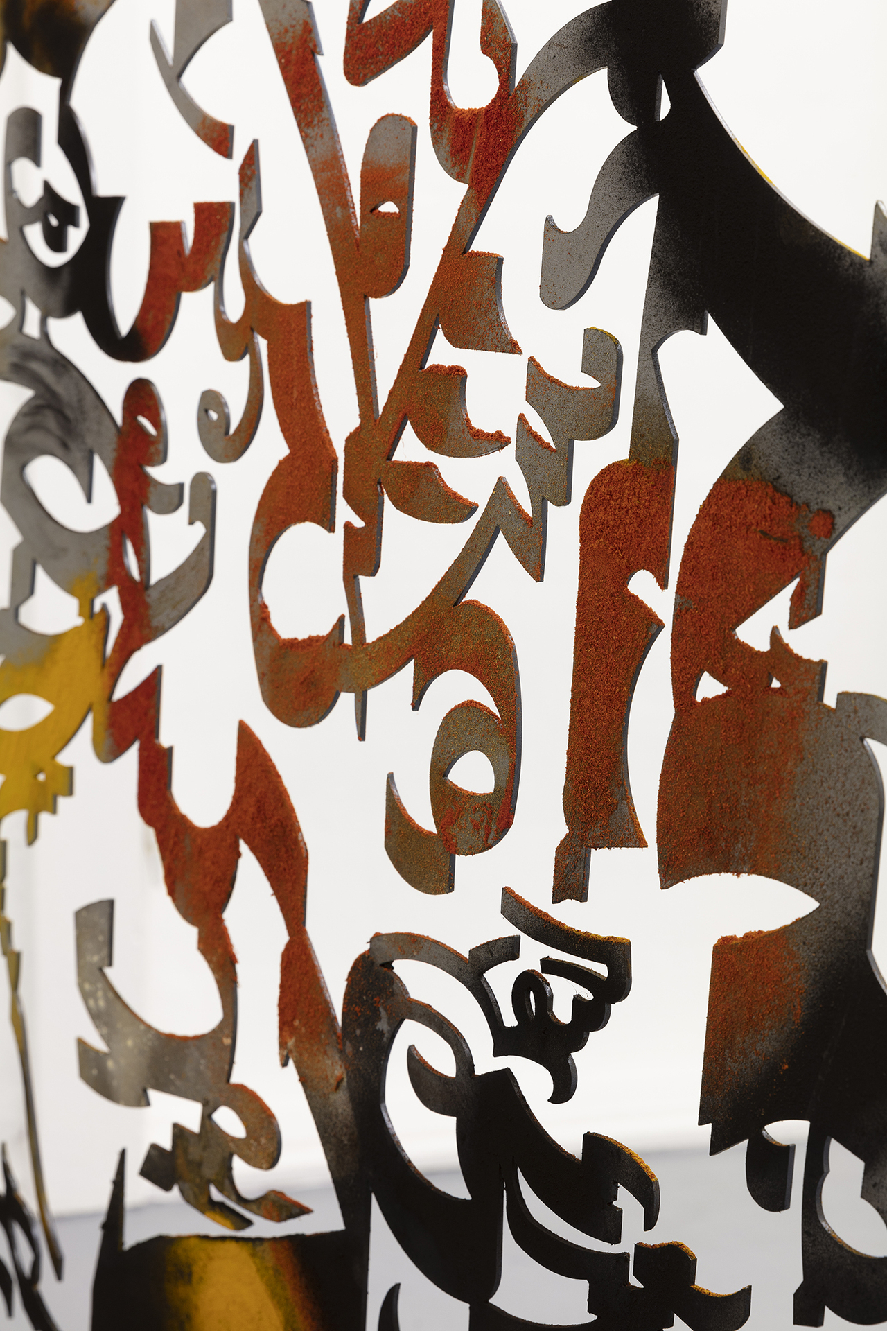 Monia Ben Hamouda, Detail from Aniconism as Figurative Urgency (I thnan), 2021, Laser cut steel, spice powders, circa: 136.7 × 144 × 0.3 cm