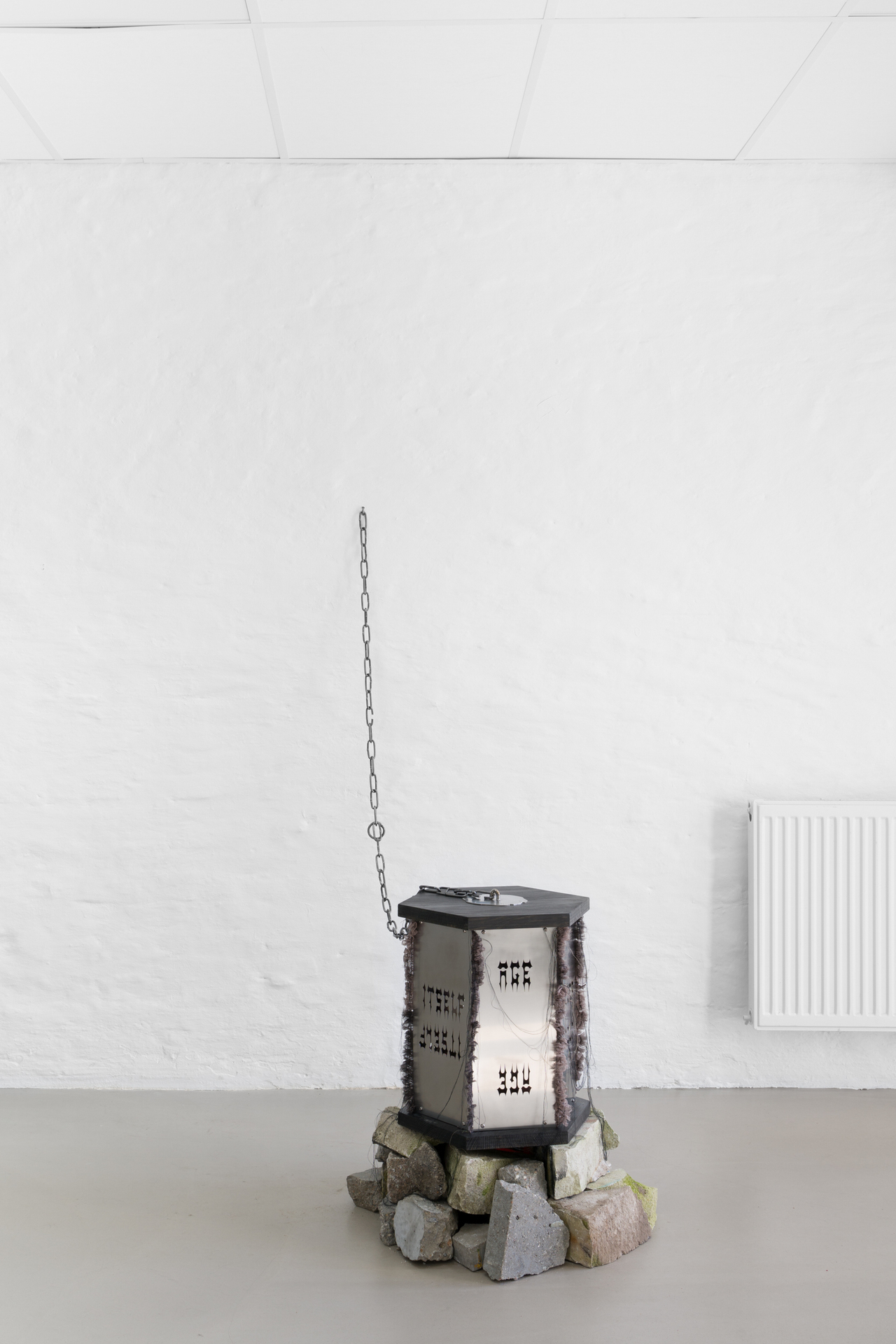 Kerosene (Age undoes itself), steel, wood, light, silk, aluminium, 2021