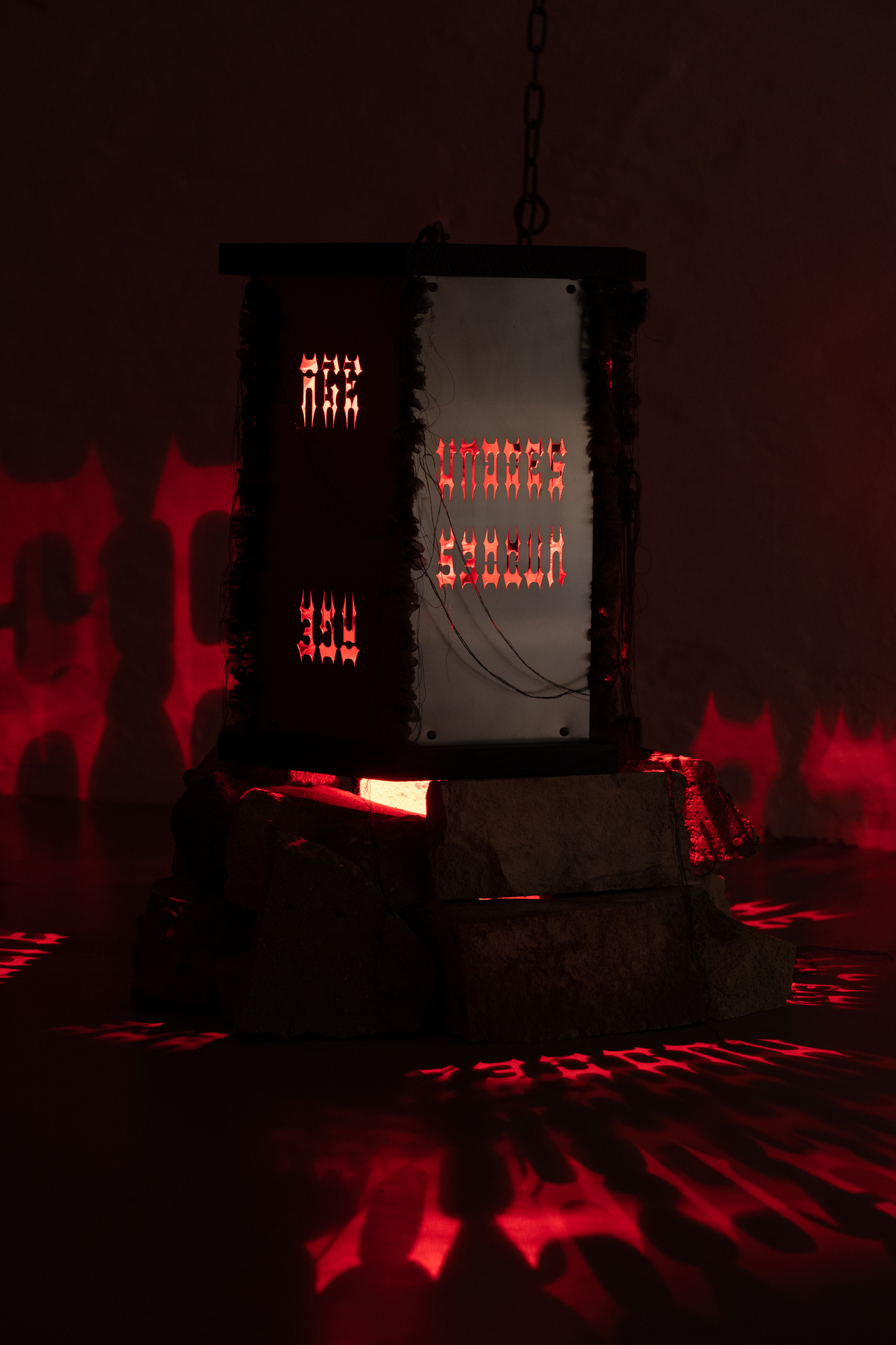 Kerosene (Age undoes itself), steel, wood, light, silk, aluminium, 2021 (in the dark)