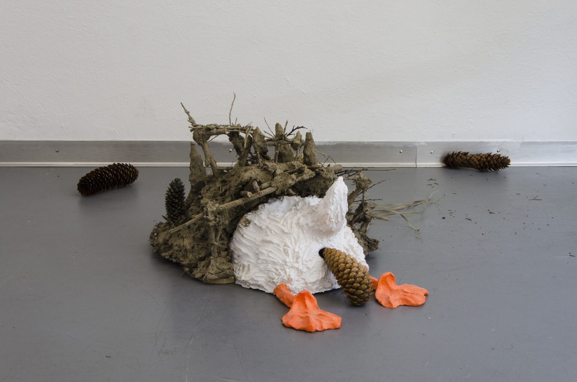 burrows, 2021, polyurethane, paint, dirt, sticks, stones, cones