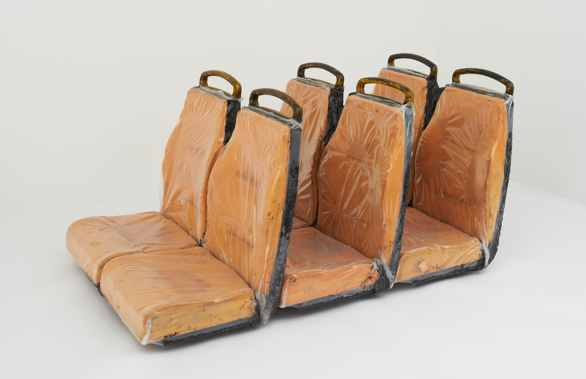 Rhea Dillon, From Landing To arriva(L) In Clear Waters Only I Can Paint Black, 2021, Foam, bus seats, non drying anti-climb paint, plastic, acrylic paint and bleach, 135 x 88 x 72 cm