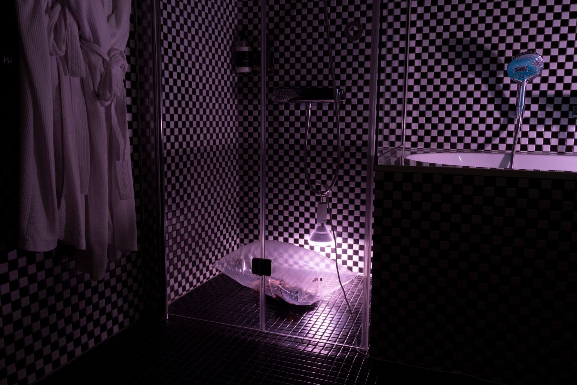 Dan Brown Brønlund “Exogel” (2021) Roots, textile, clay, chalk, pigment, foodcoloring, water, vacuum bags, LED lights. Dimensions variable.