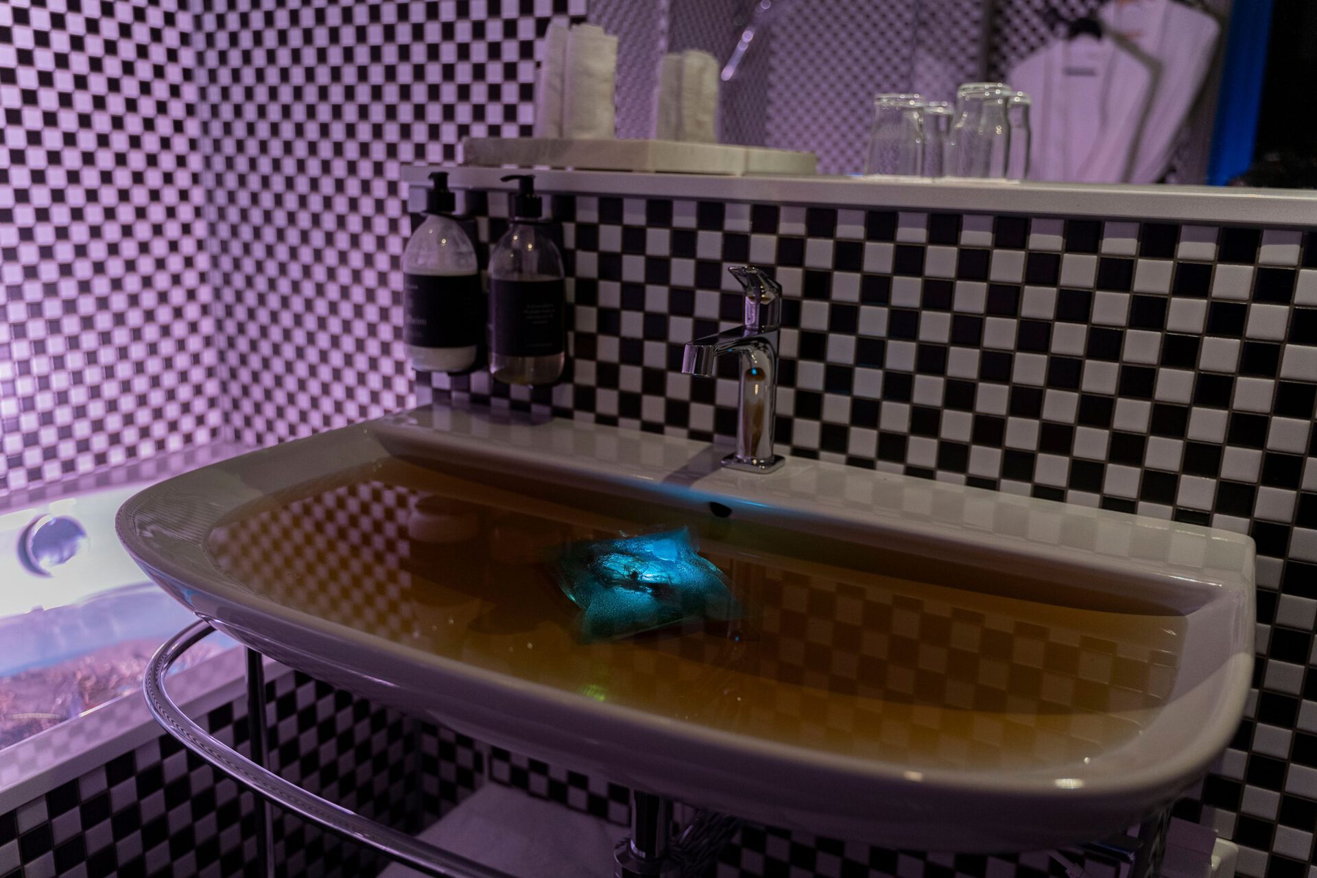 Dan Brown Brønlund “Terraformers” (2021) Roots, clay, chalk, pigments, leaves, water,  vacuum bags, grow lights.  Dimensions variable.