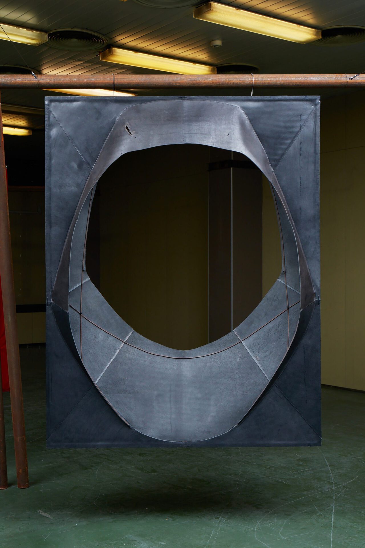 Adrian Kiss, Leather Hole 1, 2021, Leather, metal structure, 185 × 150 cm