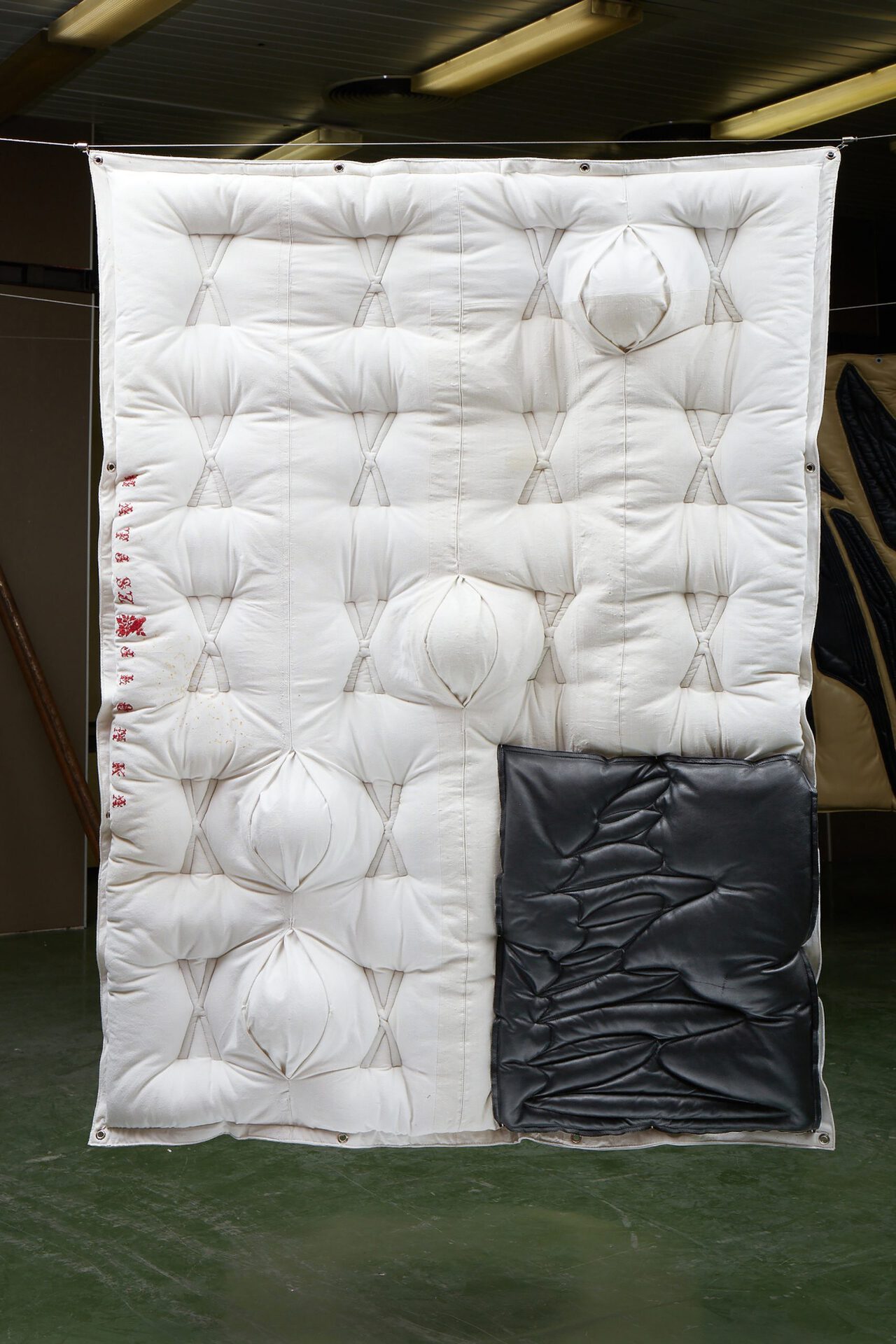 Adrian Kiss, Dunyha Firka 1, 2021, Quilted leather and canvas  with acrylic spheres, 200 × 140 cm