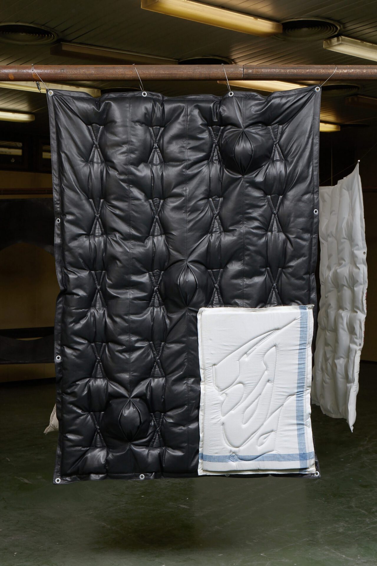 Adrian Kiss, Dunyha Firka 1, 2021, Quilted leather and canvas with acrylic spheres, 200 × 140 cm