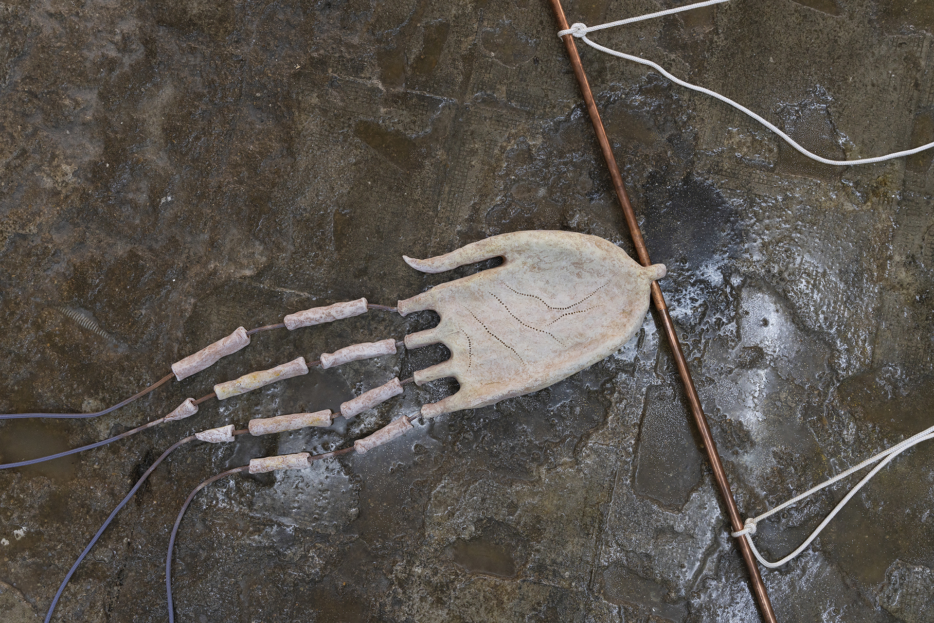 Edouard Nardon, Alpha Scorpii (detail)
, 2021, Painted terracotta, copper tube, ropes, peep hole, soap, water, ziplock, printed paper, metal container, linen oil, acetone, memory foam, metal tool, Variable dimensions