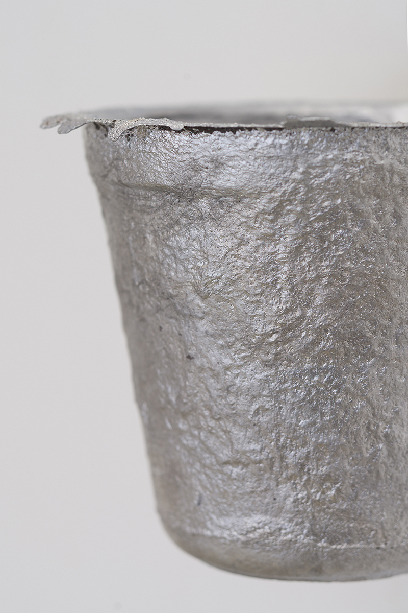 Liesl Raff, Bucket 5 (detail), 2021 (Aluminium, steel, coal, copal, 15 x 15 x 15 cm).