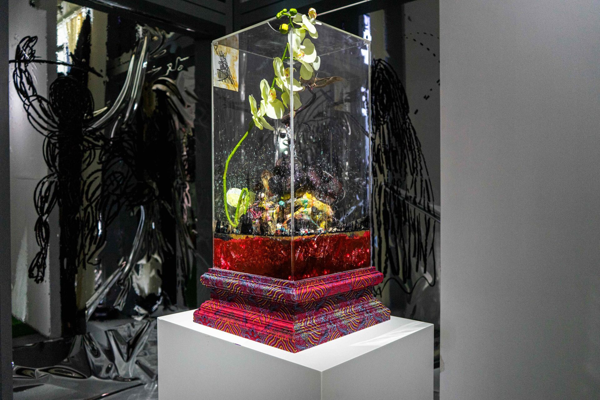 Chen Pin Tao, Tatlin’s Tower (Corpse), 2021, Acrylic glass, fishing rod holder, taxidermized moths, inkjet print on paper, resin, dried cicada shells, skull beads, steel wire, 3D print filament, crystals, expoxy clay, 75 x 38 x 38 cm