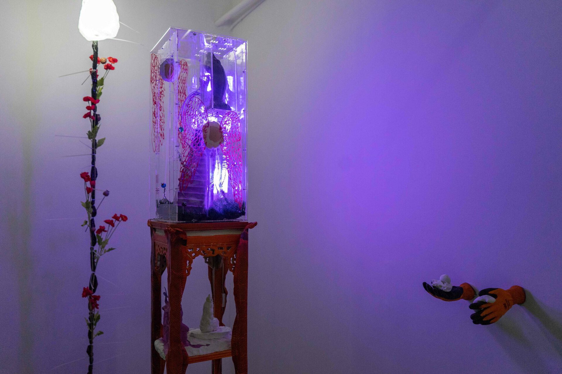 Chen Pin Tao, The Making of a Flawed World, 2021, Wood, taxidermized snake, paper clay, glass beads, body piercing jewellery, jello powder, epoxy clay, PVC, acrylic glass, styrofoam, acrylic, steel wire, fluorescent light, monster dildo, faux grass, 3M gloves, crytals, silicone, 170 x 30 x 30 cm