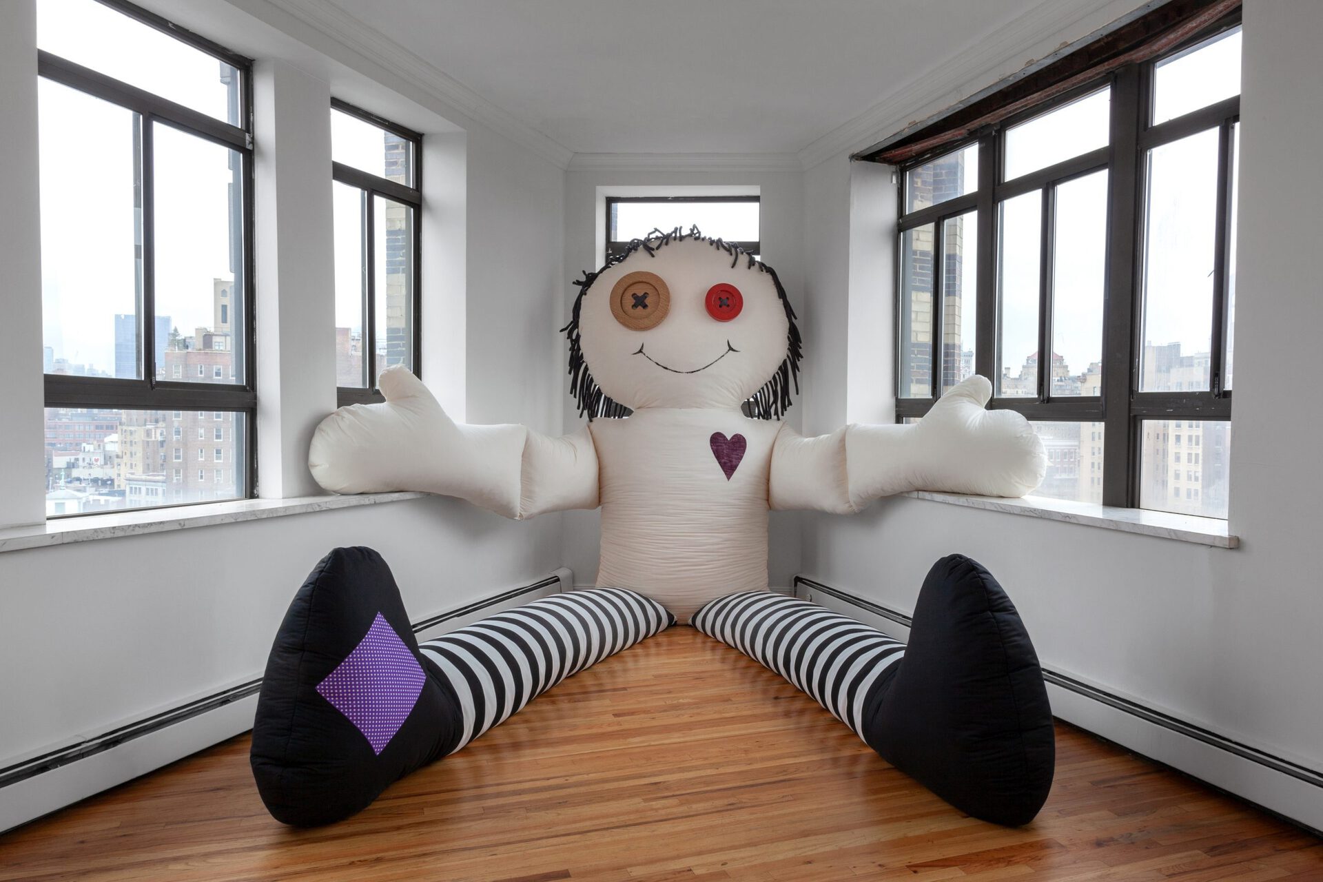 Abby Lloyd, Goodbye Dolly, 2021, fabric, poly-fil, batting, foam, packing peanuts, plaster, vinyl, spray paint, 98 x 148 x 160 in.