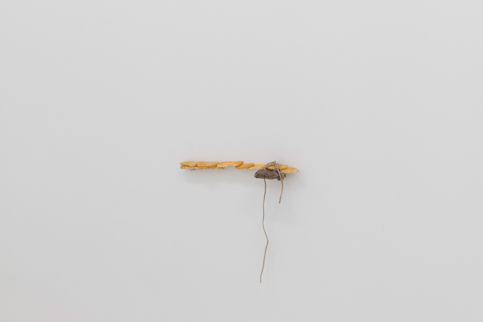 Kåre Frang, Attachments, 2021, Hand-painted Jesmonite, silicone, hot-melt glue, epoxy, varnish, stone, twine, 34 x 8 x 3 cm