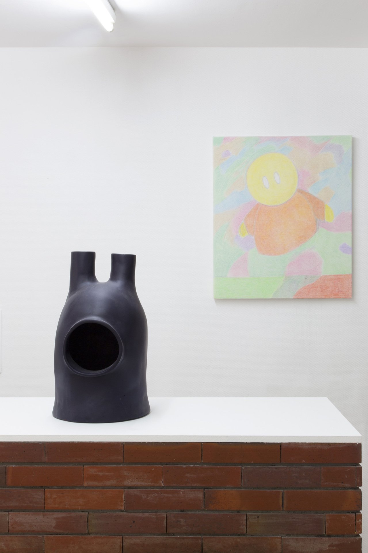 Foreground: Hélène Labadie, The bad seeds 1, (candlesticks for giant table), 2019 Background: Melanie Akeret, (hug emoji), 2021