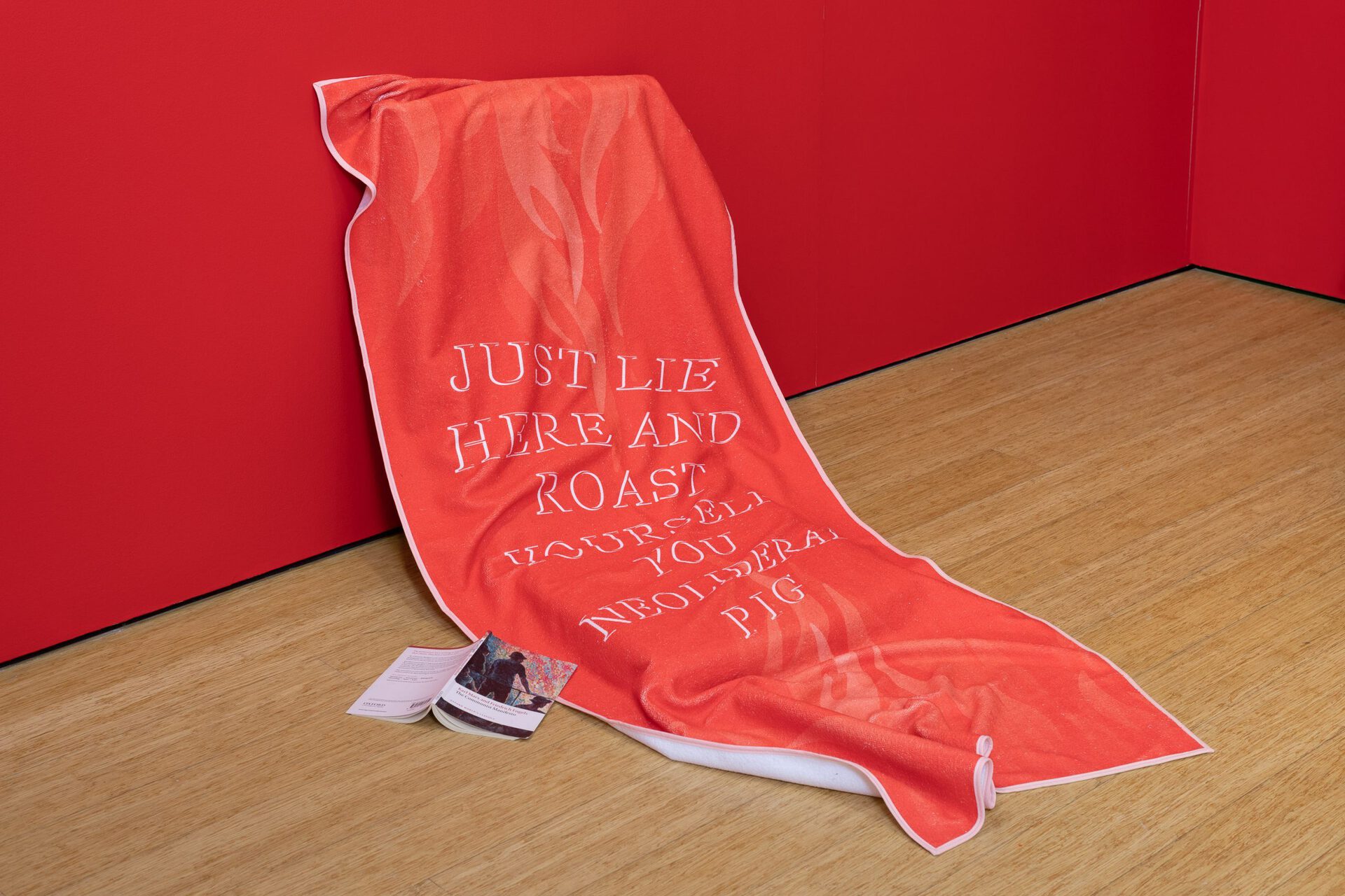 Anton Benois, Permanent Vacation, 2021, beach towel, communist manifesto, 0.7m x 1.9m