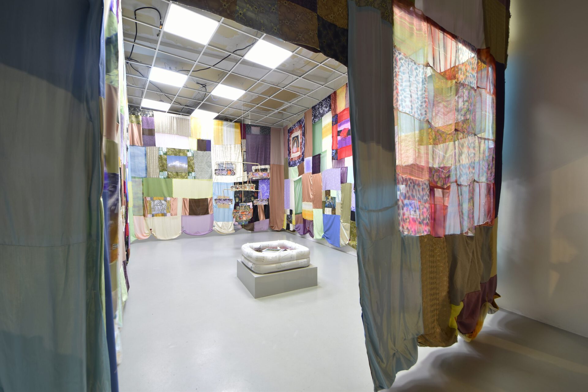 Viola Morini x Giacomo Giannantonio, "No child left behind", 2021, site-specific installation with various fabrics, variable dimensions