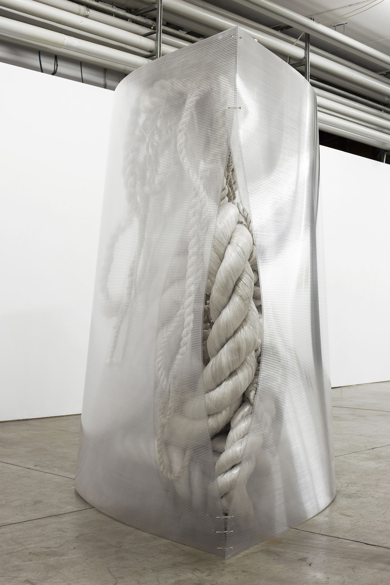 Sophie Hirsch, Untitled, XXL, 2021. Side view 1. Used packaging material, webplate, metal, 205 x 330 x 115 cm. Ph. Sophie Hirsch