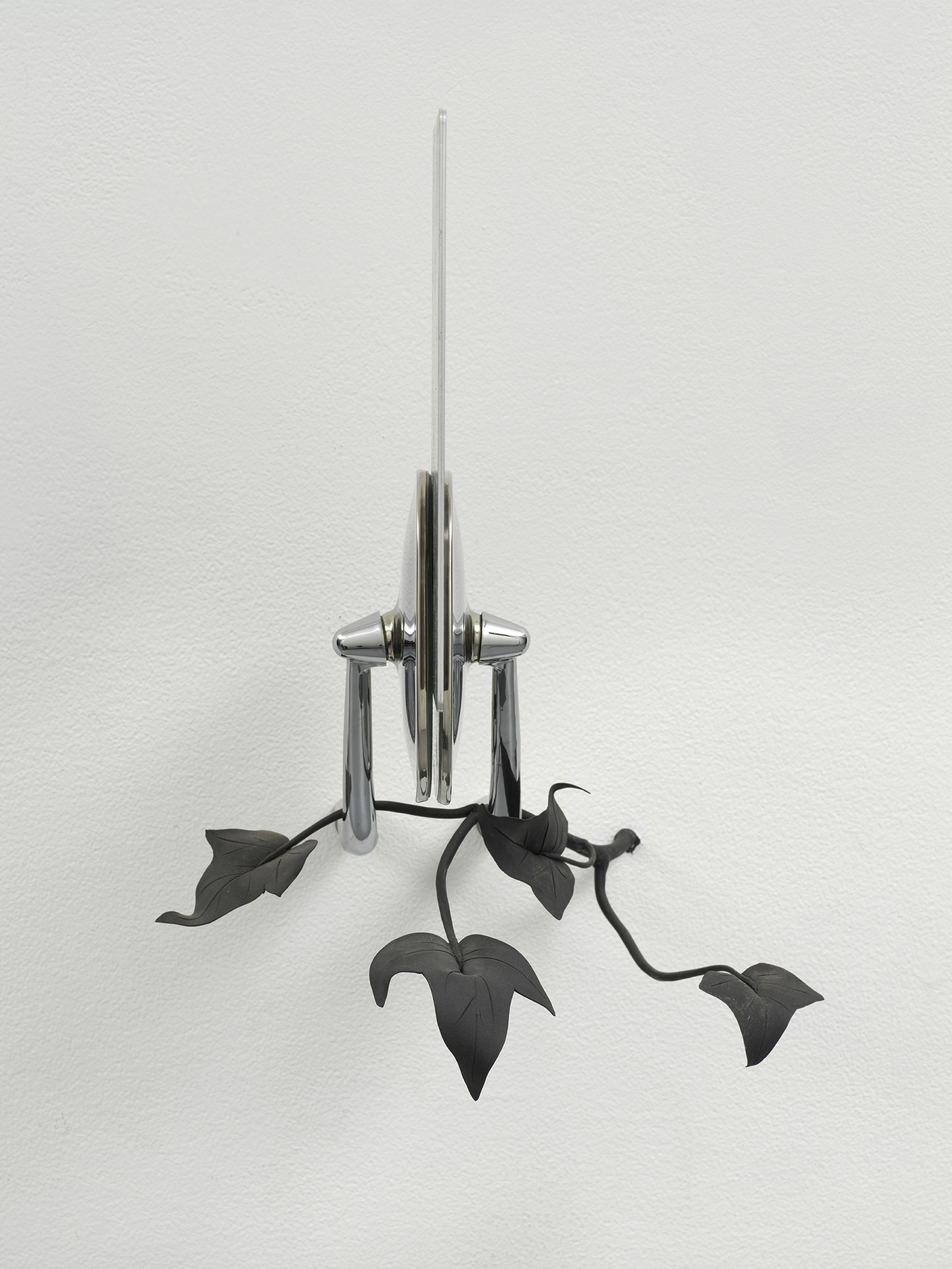 Christine Rebhuhn, Traits and Cutting Edges, front view, 2021, Mirrored photographs on aluminum, Volkswagen side mirrors, colored porcelain, 15 x 11 x 14 inches.