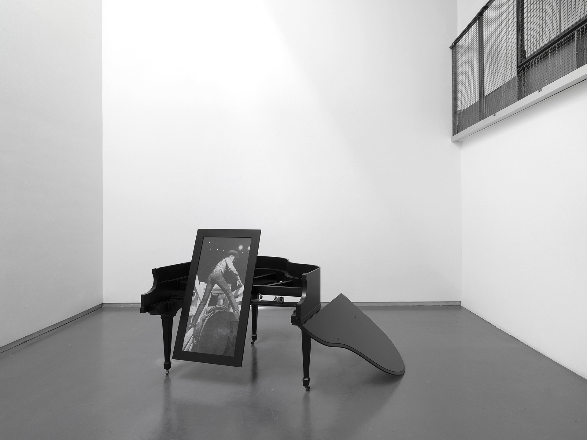 Christine Rebhuhn, Words Dry and Riderless, 2020, Piano frame, wood, lacquer, photograph, acrylic, colored porcelain, 52 x 79 x 56 inches.