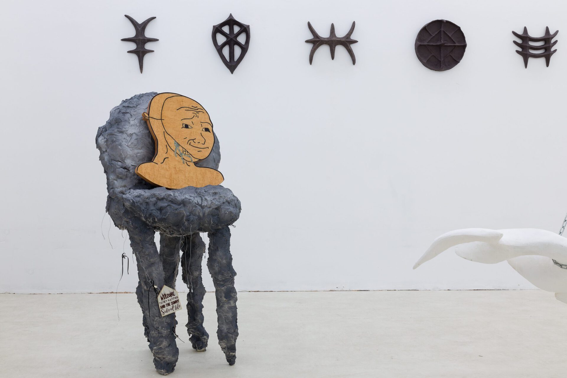 Karolina Jarzębak, IT’S NOT FAAAAAIIIIIIR, intarsia, polyurethane foam, spray on putty, ready made elements, 2021