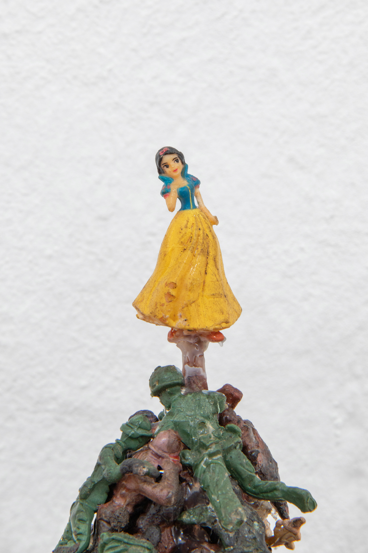 detail: Five Types of Soldiers, 2011, plastic figurines treated with cyanoacrylate and nitrogen enriched gasoline, 17 × 27 × 20 cm on top of handcrafted oak shelf, courtesy of the gallery