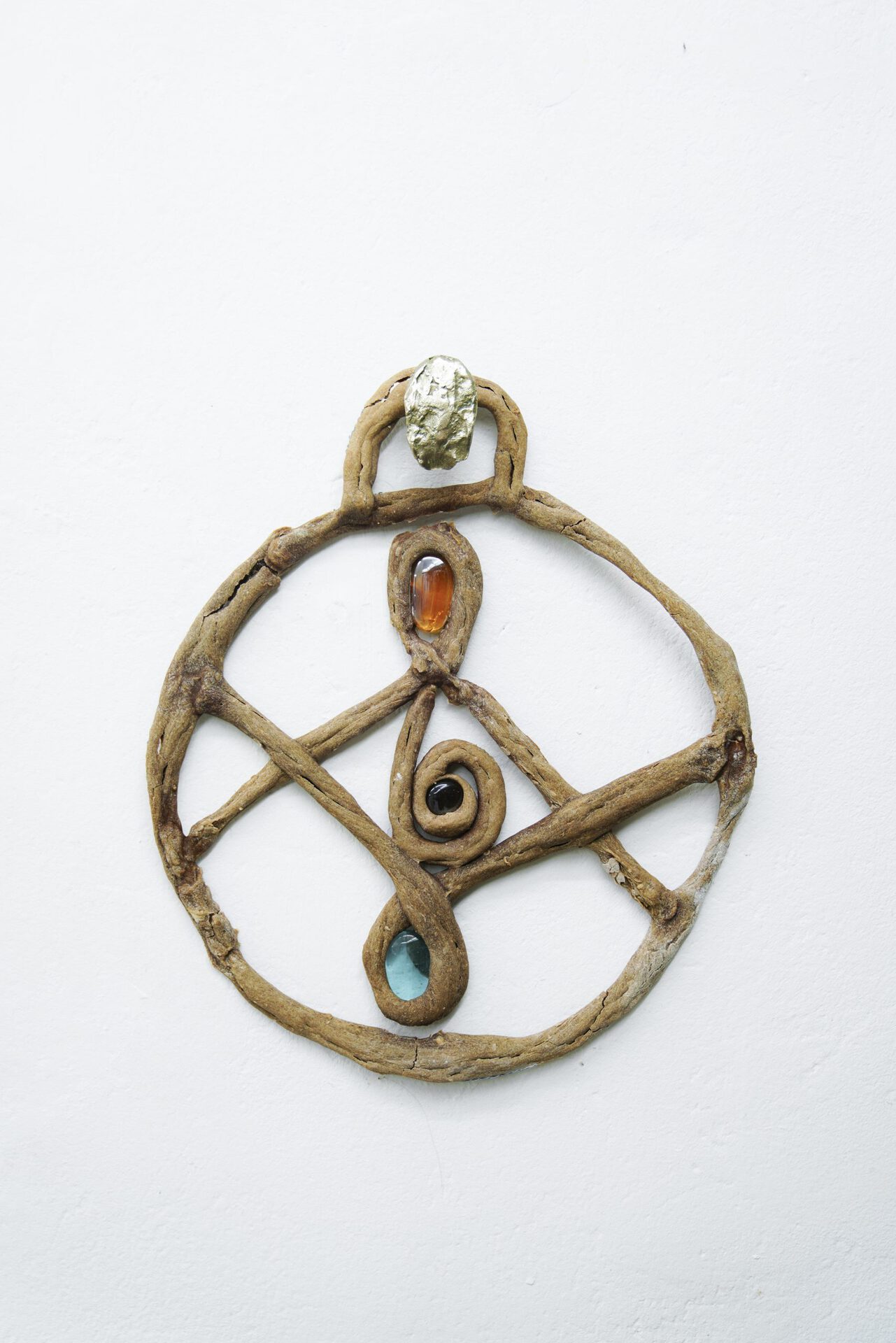 Jenna Kaes, Stained glass bretzel, 2022, bread, glass, casted bronze