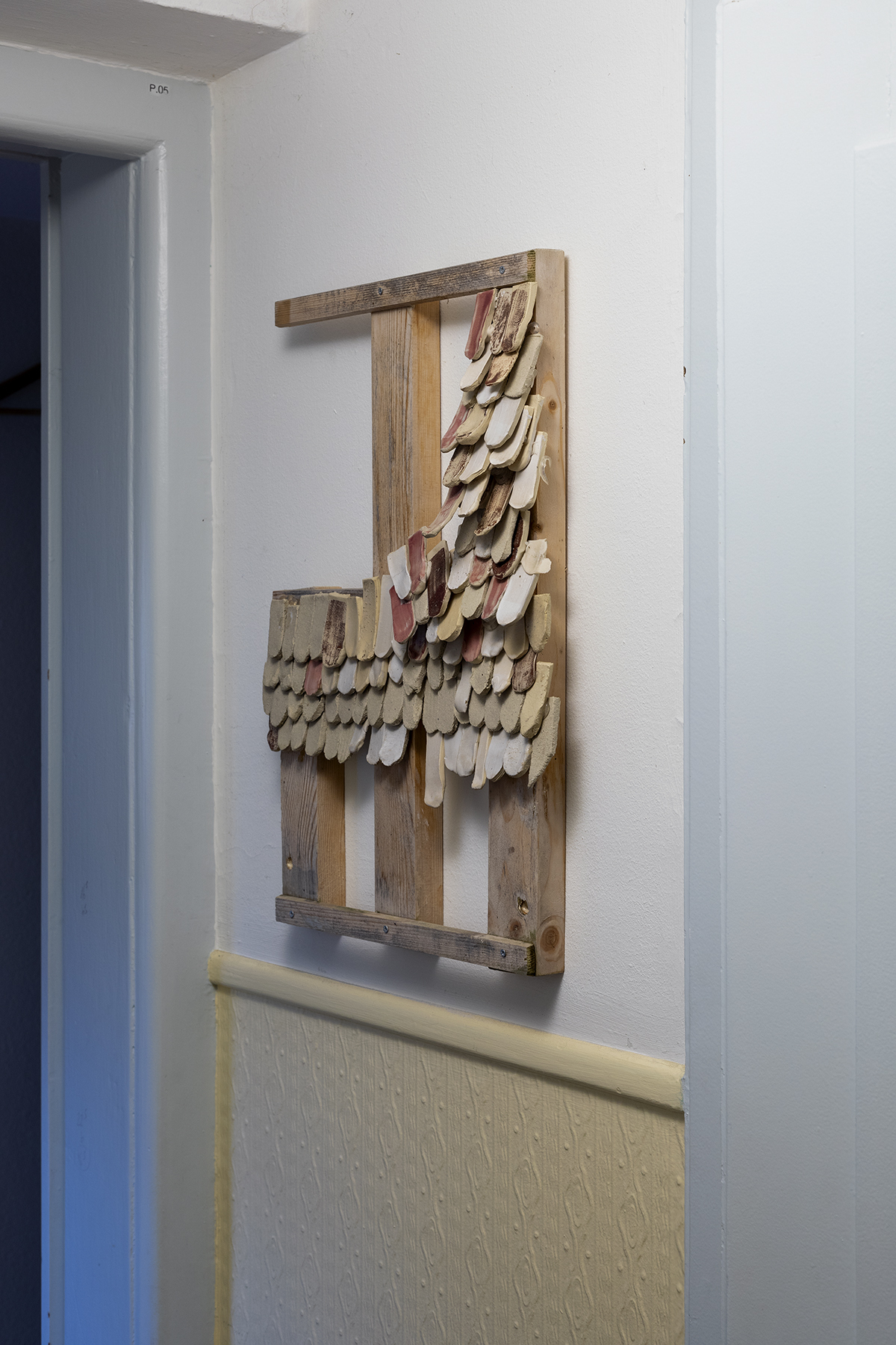 Val Minnig, Clicc Clicc, 2021. Ceramics on wood