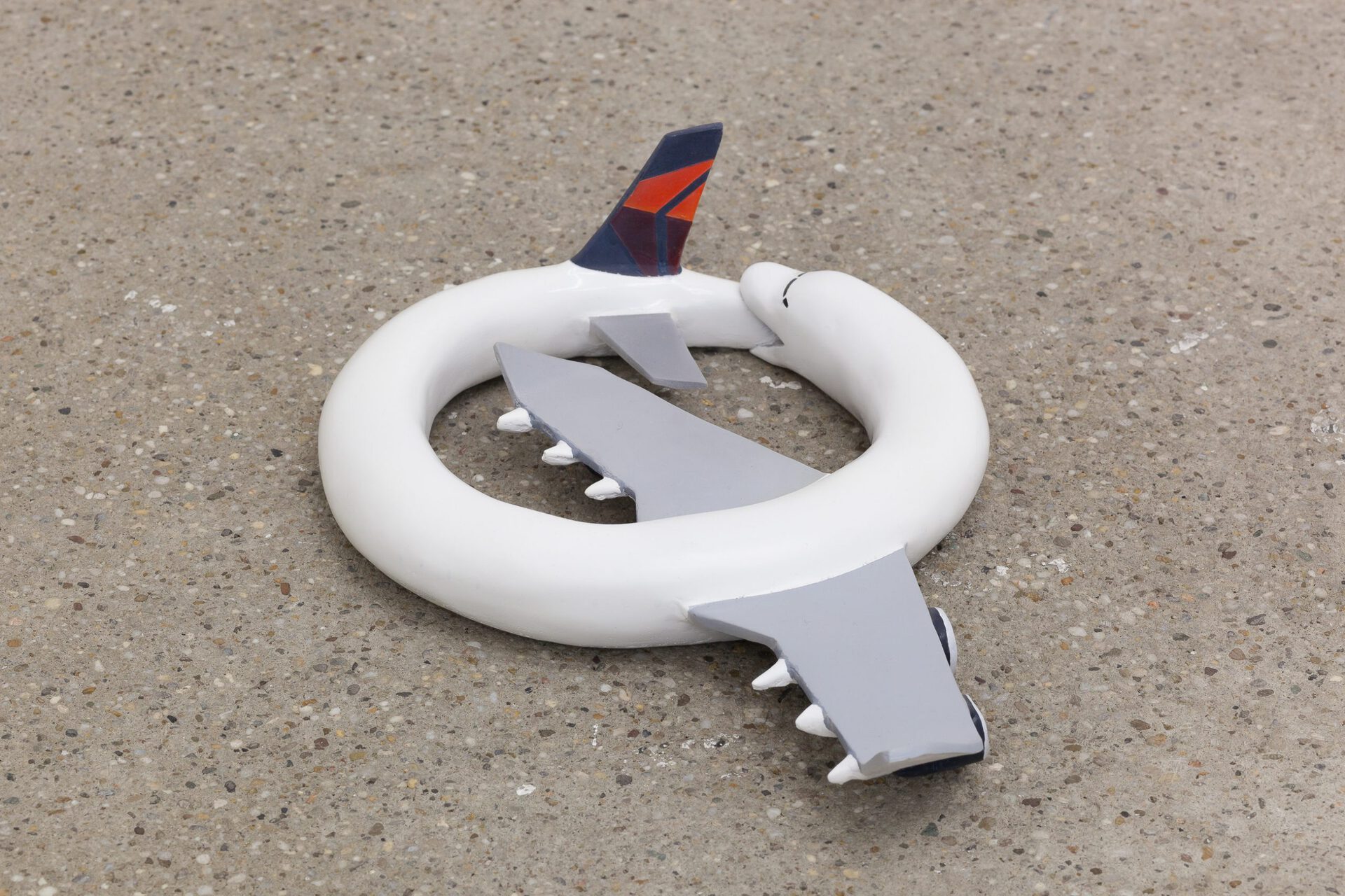 Paul Spendier, "Sleeping Plane (orange and blue spotted)", 2021, acrylic resin casting, varnished, Ø 37 cm
