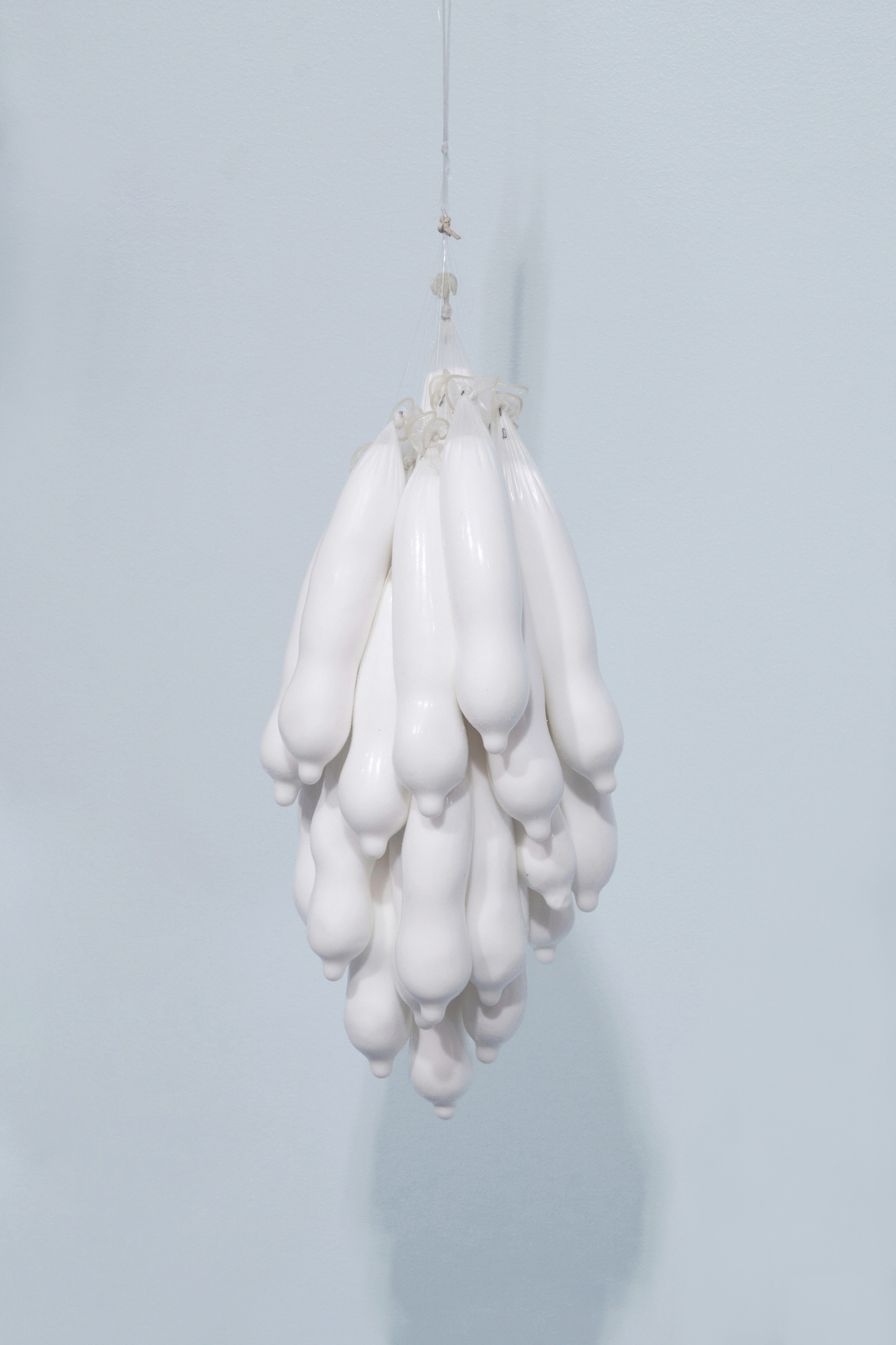 Anastasia Savinova, We Swim in One Water, act IV, ocean blue / 2021 / condoms, salt