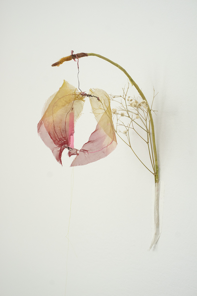 Maryna Sakowska, Hangover lantern, 2020, candle, wire, dry plant, textile, net, tape, 26x10x16 cm