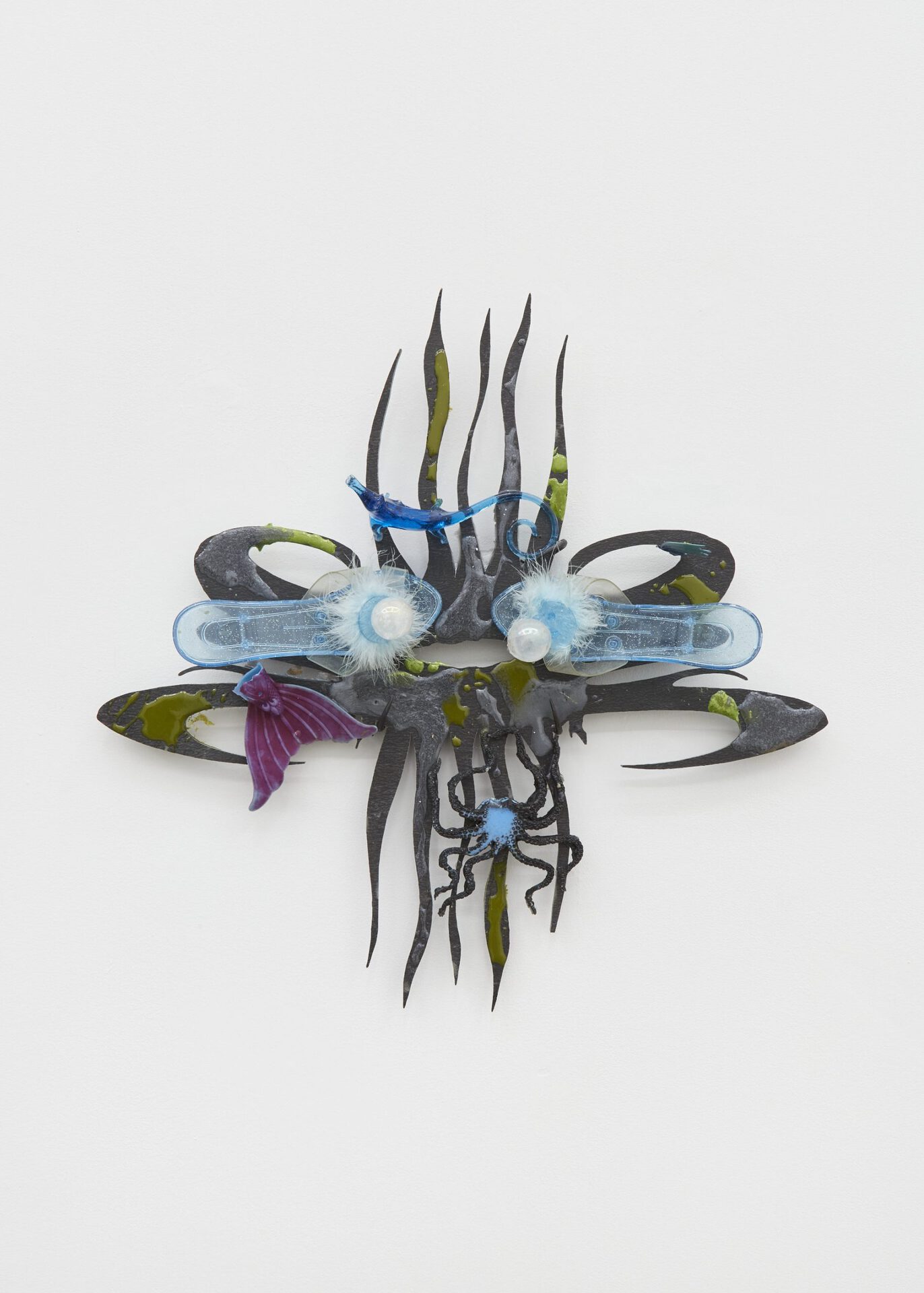 Break me, 2021. Epoxy resin, quartz polished crystal spheres, glass found object, silicone, plastic Barbie tail, shoes, butchers hooks, slate, 56 (L) x 55.5 (W) x 8 (D) cm