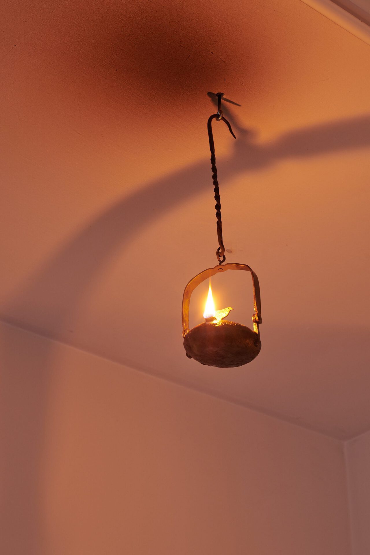 Eliza Ballesteros FRENCH FROG (2022), iron, lamp oil, wick, 15 x 15 x 40 cm