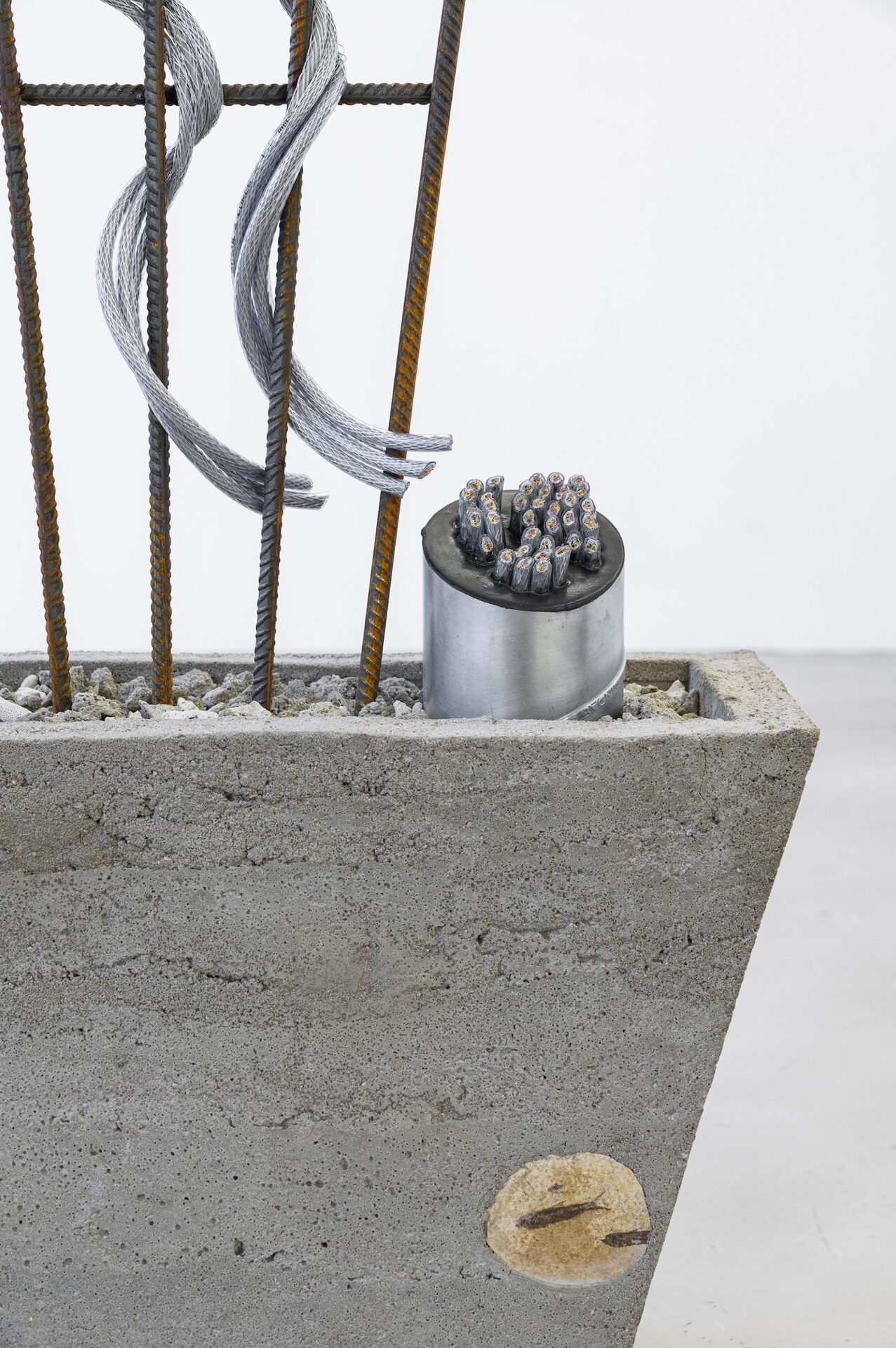 Josephine Baker - Versunkene Landschaft (Sunken Landscape) #1 (detail 1), 2022, cable, cable ties, concrete, concrete rubble, coral fragments, Dover chalk, epoxy resin, fossil fishes (Knight Alta, Eocene rock), paint, pine, plaster, plywood, rubber, security light, steel ducting, steel reinforcement bars, tube clips, 205.5x191.5x29 cm