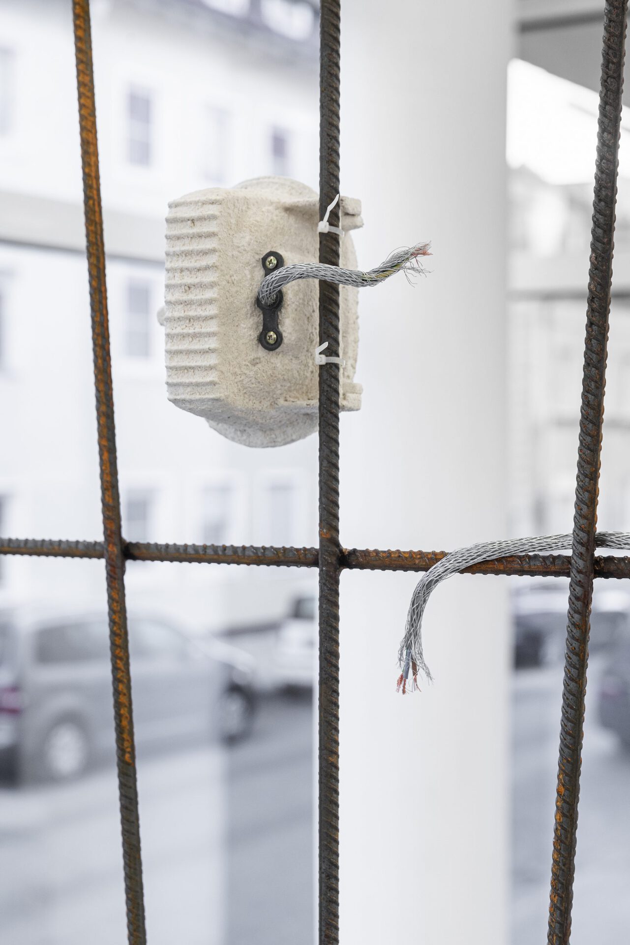 Josephine Baker - Versunkene Landschaft (Sunken Landscape) #1 (detail 3), 2022, cable, cable ties, concrete, concrete rubble, coral fragments, Dover chalk, epoxy resin, fossil fishes (Knight Alta, Eocene rock), paint, pine, plaster, plywood, rubber, security light, steel ducting, steel reinforcement bars, tube clips, 205.5x191.5x29 cm